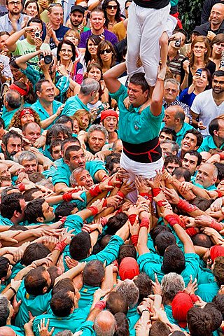 Castellers de Vilafranca 'Castellers' building human tower, a Catalan tradition Festa de la Merce, city festival Placa de Sant Jaume Barcelona, Spain