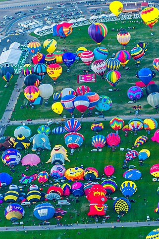 Aerial view of hot balloons preparing to lift off at Balloon FIesta Park, Albuquerque International Balloon Fiesta, Albuquerque, New Mexico USA