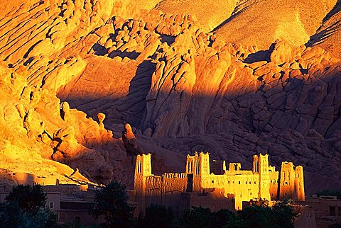 Fort in the Gorge of the Dades, catching dusk light, High Atlas Mountains, Morocco, Africa.