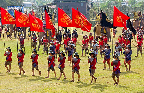 marching into battle at the Surin Elephant Festival in Thailand