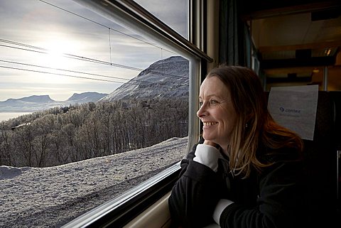 Woman on Iron Line Railway, Kiruna to Narvik, Lapland, Sweden, Scandinavia, Europe
