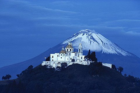 Catholic Church, famous twin volcano in background, Mexico, Cholula