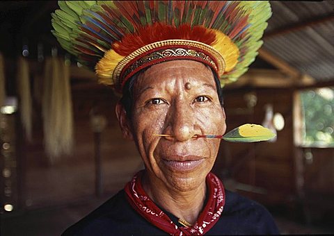 Indigenous people, ecuador. Huaorani tribe in the amazon rainforest. Their territory is land-titled but as the ground below is owned by the ecuadorian government, their territory is heavily invaded by national and international oil companies .An old huaora