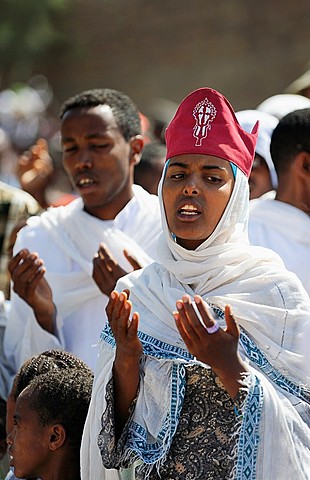 Ethiopia, Lalibela,Timkat festival, Singing devotees  Every year on january 19, Timkat marks the Ethiopian Orthodox celebration of the Epiphany  The festival reenacts the baptism of Jesus in the Jordan River  Wrapped in rich cloth, the church Tabots