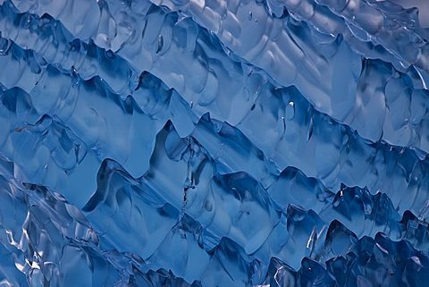 Glacial iceberg detail from ice calved off the Sawyer Glacier in Tracy Arm, Southeast Alaska, USA.