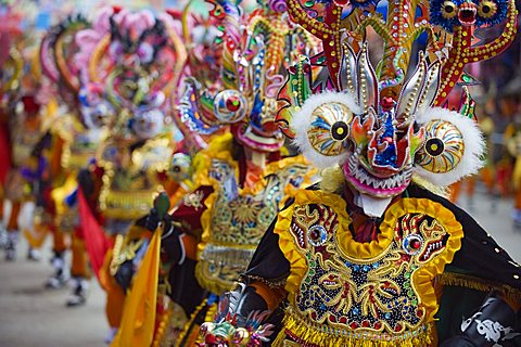 Masked performers in a parade at Oruro Carnival, Oruro, Bolivia, South America