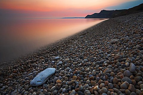Twilight over the pebbly shore at Eype, Jurassic Coast, UNESCO World Heritage Site, Dorset, England, United Kingdom, Europe