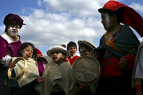 People celebrate during the fiesta of Carnival, in Guamote, Ecuador, on Tuesday, Feb. 28, 2006.
