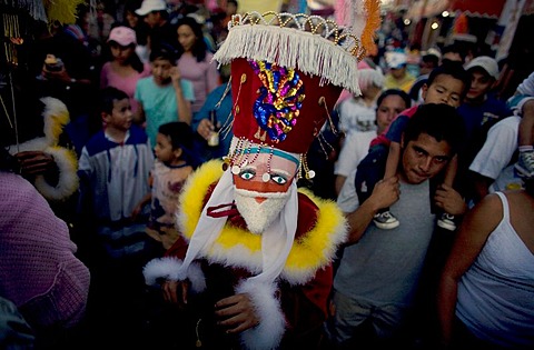 A Chinelo dancer performs during carnival celebrations in Tlayacapan, Mexico, February 5, 2008. Groups of Chinelos dance the "Brinco del Chinelo," or the "Chinelo Hop" during Carnival. Spanish colonizers brought the tradition of Carnival to the Americas, w