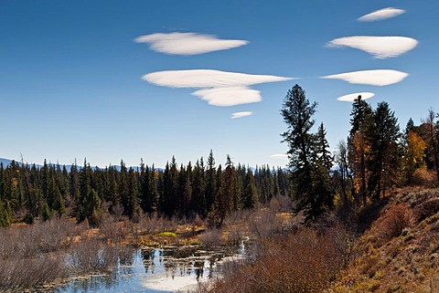 Lenticular clouds over Moose Pond, Autumn, Grand Teton National Park, Wyoming, USA
