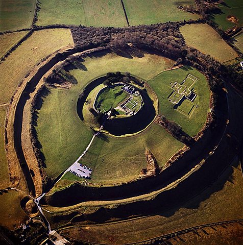 Aerial image of Old Sarum, the original site of Salisbury with castle ruins and cathedral foundations inside two high Iron Age banks (earthworks), Wiltshire, England, United Kingdom, Europe
