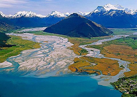 Glenorchy with Dart River mouth left and Mt Earnslaw 2819 m right aerial view from over Lake Wakatipu New Zealand