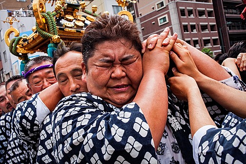 Detail, bearers of Mikoshi,Sanja Matsuri Festival, in Kaminarimon dori,next to Sensoji Temple, Asakusa, Tokyo, Japan, Asia
