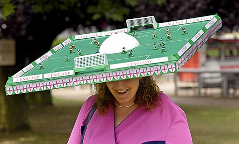 Race-goer wearing a football pitch hat at Royal Ascot Races