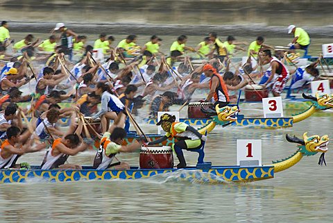 Dragon boats racing during Dragon Boat Festival, Ap Lei Chau, Hong Kong, China