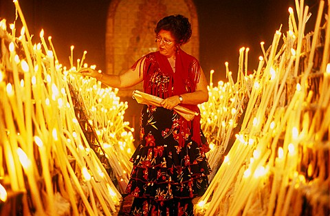 El Rocio Romeria pilgrimage,Votive candles in the side chapel of the Ermita del Rocio, El Rocio, Almonte, Huelva province, Andalucia, Spain