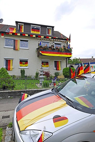 House and car decorated with German flags during Football World Cup 2010, Stuttgart, Baden-Wuerttemberg, Germany, Europe