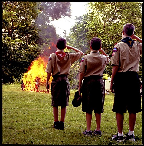 Boy Scouts salute the flag during a Flag Retirement ceremony presided over by the American Legion Post 121 in Little Falls, NJ. Each year on or around flag day, June 14th, veterans organizations and boy scouts ceremoniously burn discarded US flags that the