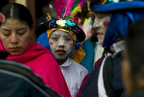 Boy in traditional costume in the Fiestas of Inti Raymi in northern Ecuador