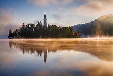 Lake Bled at dawn with Santa Maria Church (Church of Assumption), Gorenjska, Julian Alps, Slovenia, Europe