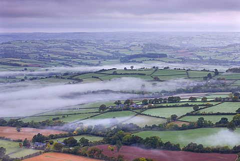 Mist covered rolling landscape near Llangorse, Brecon Beacons National Park, Powys, Wales, UK. Autumn (October) 2009