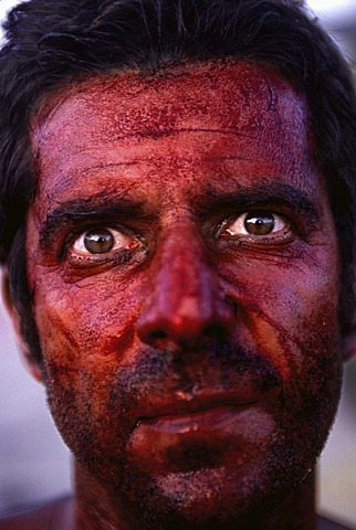 A painted man stares into the lens at Burning Man in the Black Rock Desert, Nevada on August 29, 2002.  Burning Man is an art festival that celebrates free expression.  In 2002 about 29,000 people attended the festival that started in 1986 when Larry Harve