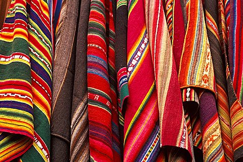 Pisac Village in the Valley of the Incas Sunday Market, one of the world's most colorful markets traditional textiles, Cuzco area, Highlands, Peru