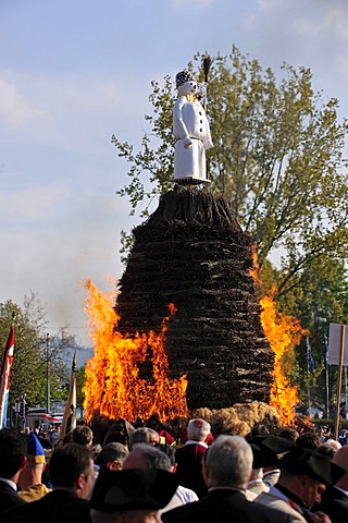 The Boeoeg, a doll symbolizing winter, is burned at the Sechselaeuten, traditional festival; the various guilds stand and ride around the fire, Zurich, Switzerland, Europe