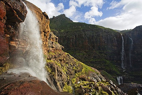 Waterfall Cascada El Palmar in the sunlight, Cascada El Escobar in the background, Valley of El Risco, Parque Natural de Tamadaba, Gran Canaria, Canary Islands, Spain, Europe