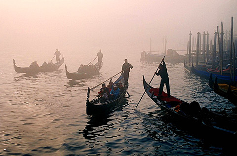 Gondolas in the fog, Grand Canal, Venice, Italy