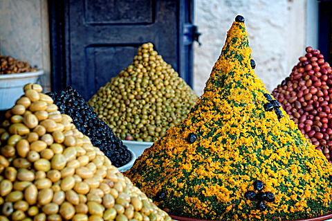 Moroccan olives at a food street stall in Essaouira medina, Morocco.