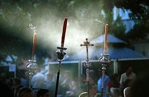 Malaga-Spain - Easter Week (Semana Santa) - Smoking candles held during a procession