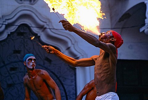 An Afro-Cuban dancer spitting fire at a festival of Afro-Cuban Culture in Guanabacoa just east of Havana, Cuba