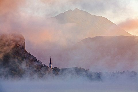 St. Martin's Church on shore of Lake Bled at dawn, Bled, Gorenjska, Julian Alps, Slovenia, Europe