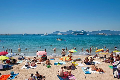 Sunbathers on the beach at Cannes, Cote d'Azur, France