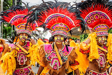 Participants of the parade during the celebration of Dinagyang in homage to 'The Santo Nino', the patron saint of many Philippino cities Iloilo, Philippines